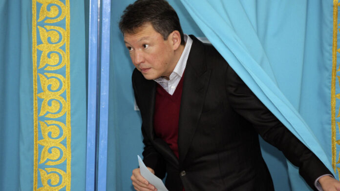 Kulibayev, son-in-law of Kazakhstan's President Nazarbayev, leaves a voting booth at a polling station during the parliamentary election in Astana