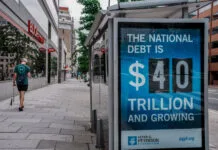 Deficitul federal al SUA urcă la 1,992 trilioane de dolari în 2026, iar dobânzile datoriei ating un record de 1,1 trilioane